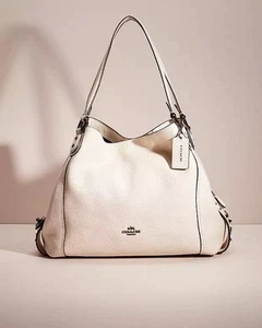 Bolso de mano Coach de cuero blanco Edie 31 con remaches de estrella - Imagen 1 de 15