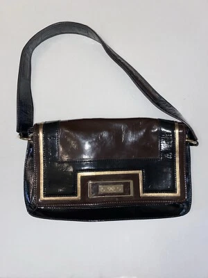 Bolso Cartera Anya Hindmarch Marrón Negro Dorado Cierre Magnético Tono Dorado Herrajes Foto 1 de 4