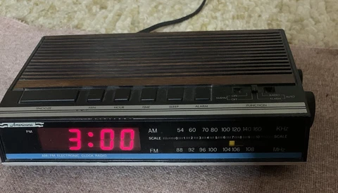 Vintage Americana Alarm Clock Model 4439 Tested Works Wood Grain Cover