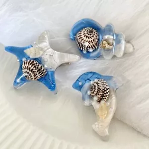 Barrette perla delfino cartoni animati - Accessorio per capelli conchiglia stelle marine artigli per capelli donna - Foto 1 di 15