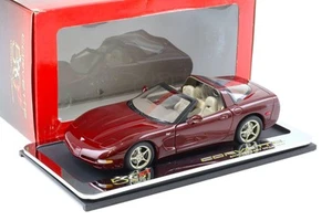 (A) 1:18 AUTOart Chevrolet Corvette C5 red 50th Anniversary with Hardtop 2003 - Imagen 1 de 4