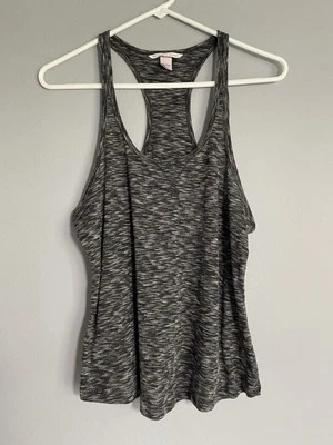 Camiseta sin mangas Victoria’s Secret espalda cruzada talla mediana negra jaspeada elástica Foto 1 de 4