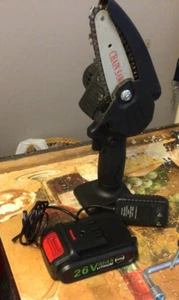 USED 4” Mini Chainsaw in hard case w/ accessories and a hard case - Picture 1 of 11