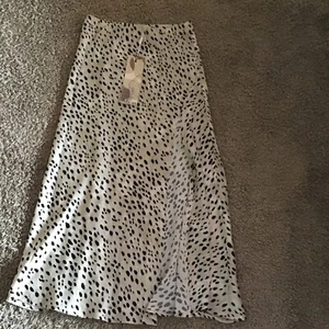 Neu mit Etikett Glimmer Größe M 3/4-Rock Leopardenmuster mit Schlitz - Bild 1 von 5