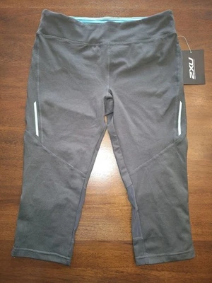 NUEVO CON ETIQUETAS 2XU Mujer Capri Leggings Gris Teal S. Foto 1 de 4