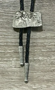 VINTAGE MT. RUSHMORE WESTERN BOLO TIE W/ LEATHER CORD BLACK HILLS NORTH DAKOTA - Picture 1 of 5