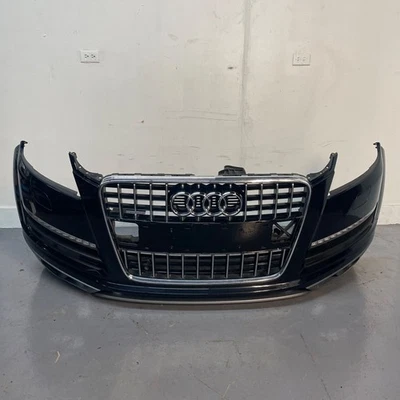 10-2015 AUDI Q7 CUBIERTA PARACHOQUES DELANTERO CON INTERMITENTE Y 3 SENSORES DE APARCAMIENTO NEGRO OEM Foto 1 de 4