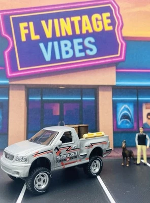 Rueda personalizada intercambiada elevada 99 Ford F-150 SVT Lightning con kit de elevación impreso en 3D Foto 1 de 4