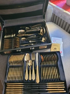 SBS Solingen Besteckkoffer  12 Personen, 70 Teile, 23/24 Goldauflage, unbenutzt - Bild 1 von 1