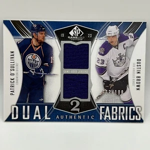 2009-10 SP Game Used Authentic Fabric Dual Dustin Brown/Patrick O'Sullivan /100 - Picture 1 of 2