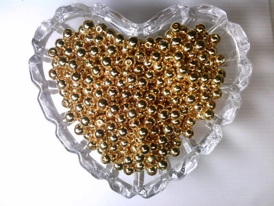 ANTIGO 100 CONTAS REDONDAS DE ACRÍLICO FOLHEADAS A OURO 6mm #011219c ORNAMENTOS - Imagem 1 de 3