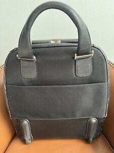 Knomo carry on Leather. wheeled bag