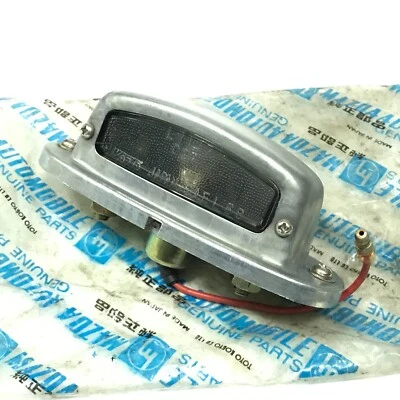 Lámpara de matrícula MAZDA FAMILIA 1000 1200 1300 1500 1600 piezas originales NOS JP Foto 1 de 4