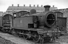 PHOTO  SR ABANDONED EX-LB&SC E2 0-6-0T NO. 32107 AT BRICKLAYERS ARMS DEPOT 1959