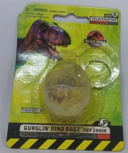 Vintage Jurassic Park Lost World Gurglin Dino Eggz Velociraptor 1997 KEYCHAIN - Picture 1 of 3