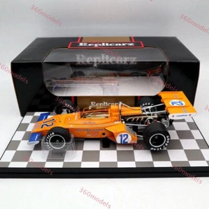 Replicarz 1:18 1972 Indianapolis 500 Peter Revson #12 R184826 Orange Diecast - Imagen 1 de 24