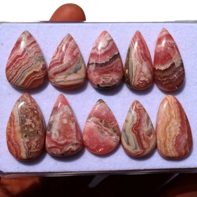10 PC Natural Argentina Rhodochrosite A+ Grade 19.7-24mm Pear Cabochon Gemstones - Image 1 of 4