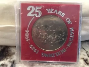 Singaporean 5 Dollar Silver Coin 25 Years of Nation Building 1959-1984 - Picture 1 of 4