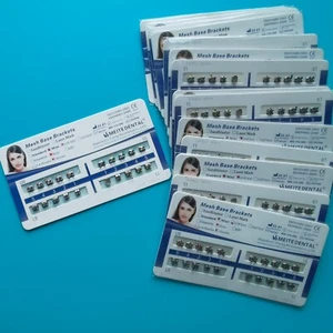 100 X Soporte de metal de ortodoncia dental Soporte Malla Base Mini Roth 018 Ranura 3 Ganchos - Imagen 1 de 6