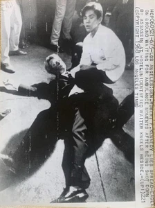 ROBERT KENNEDY LIES ON THE GROUND AFTER BEING SHOT DOWN ORIG WIREPHOTO 1968 - Picture 1 of 1