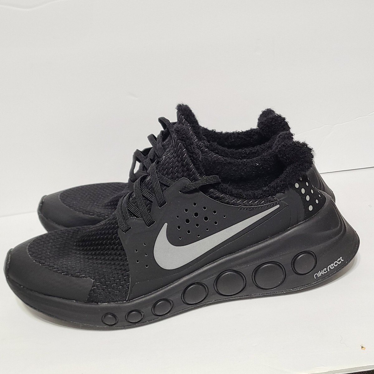 nike cruzrone triple black