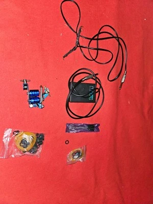  tattoo machine and pedal with o rings and cleaning brushes - Image 1 of 4