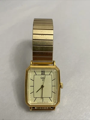 QQ Manual Mechanical Gold Tone Dial Rectangle Case Stainless Stretch Band Watch - Image 1 of 4