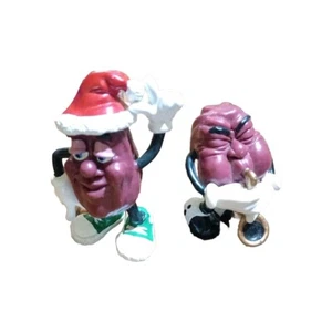 1987/88 California Raisins Calrab Saxophone Player/ Santa Figures, Lot of 2 - Picture 1 of 16