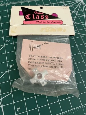 Team Class vintage 1/12 Pan Car Aluminum Left axle hub NIP RC12L X-Shape Rare! - Image 1 of 4