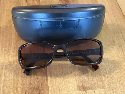 GAFAS DE SOL DE COLECCIÓN CALVIN KLEIN CK3035 Código de Color 172 Transparente Marrón Oscuro Unisex con Estuche Foto 1 de 4