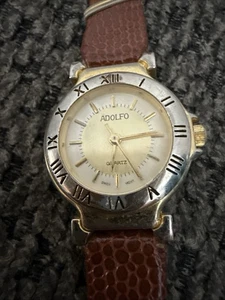 Vintage Adolfo Uhr Damen silber & goldfarben braunes Lederband braucht Batterie - Bild 1 von 7