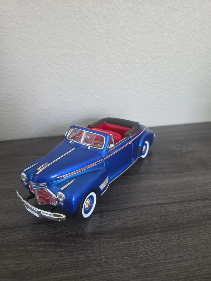  Welly 1:18 1941 Chevy Special Deluxe Convertible Metallic Blue Diecast  - Image 1 of 4