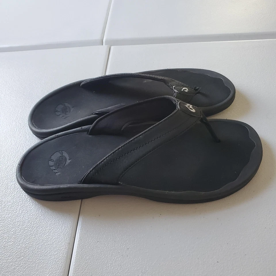 Sapatos femininos OluKai Ohana tamanho 7 preto sandálias chinelos sintéticos 20110-4040 - Imagem 1 de 4