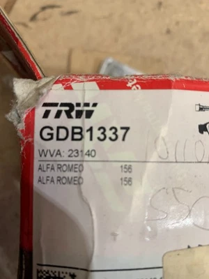 ALFA ROMEO 156 97-02 GDB1337 TRW FRONT Brake Pad FULL Set Shop Soiled 50d6 - Image 1 of 4