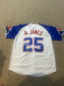 MAGLIA AUTOGRAFA FIRMATA ATLANTA BRAVES-ANDRUW JONES BECKETT COA CITY CONNECT - Foto 1 di 8