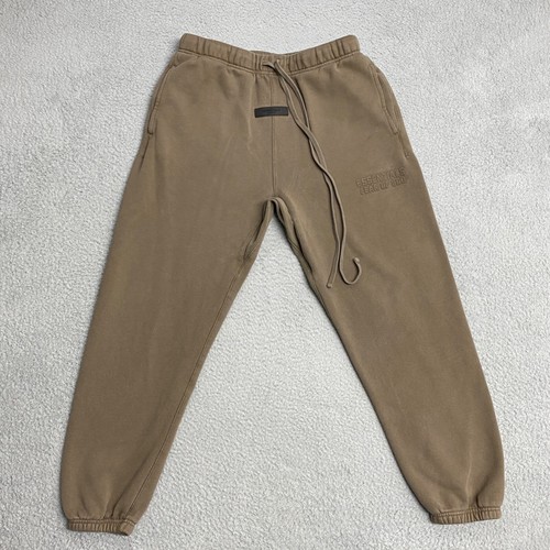 Pantaloni felpati Fear of God Essentials uomo pile marrone medio 28" cuciture interne FOG