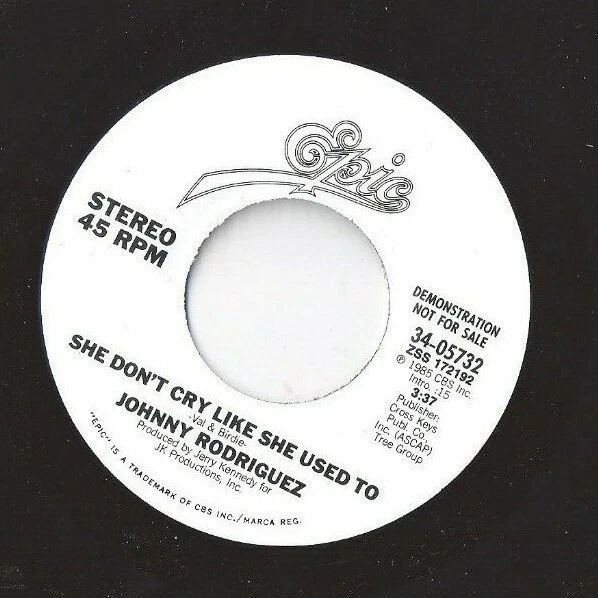 JOHNNY RODGRIGUEZ She Don't Cry Like She Used to 45 RECORD DJ PROMO  - Image 1 of 1