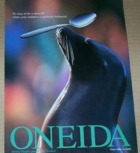 1998 print ad - Oneida Paradox silverware- cute seal trick - Advertising page - Picture 1 of 1
