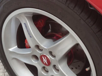 JUEGO DE CUBIERTA DE COLOR DE CUBO DE RUEDA DELANTERA Y TRASERA PARA NISSAN 300ZX Z32 OEM DISCO DE FRENO ROTOR Foto 1 de 4