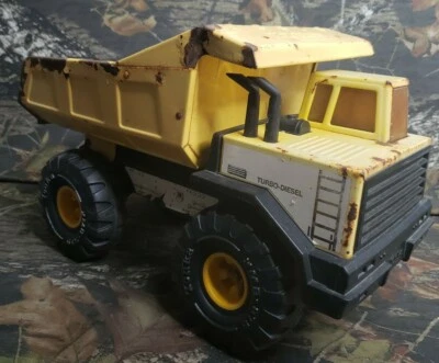 Camión de volteo Tonka de la década de 1980 diecast turbo diésel amarillo acero prensado neumáticos XMB-975  Foto 1 de 4