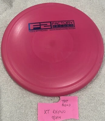 Innova Disc Golf Pink 170g Early Test Blend Xt Rhyno (09/2014) Factory Second - Image 1 of 4