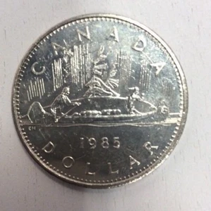 1985 $1 Canada Dollar Voyageur Canoe Coin Gnumismatist - Picture 1 of 3