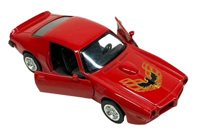 New Ray 1:32 Scale 1973 Pontiac Firebird Trans Am Diecast Model Car Opening Door - Image 1 of 4