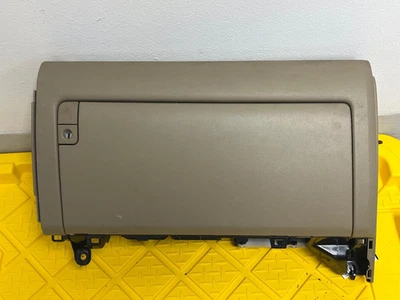 Toyota 4runner 2010 2013 guantera caja de almacenamiento beige fabricante de equipos originales usado Foto 1 de 4