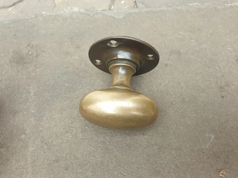 One brass old/vintage door handle/pull Cover