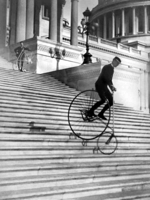 Vintage Biking Down Stairs Photo Poster Print, Pennyfarthing Bike Bicycle Decor - Image 1 of 2
