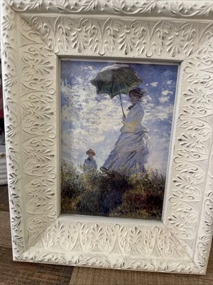 Estampa emoldurada de Claude Monet mulher com guarda-sol - Imagem 1 de 4