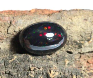 Cabujón de ópalo negro etíope de 6,13 quilates 15x10x7 mm forma ovalada Welo ópalo de fuego - Imagen 1 de 3