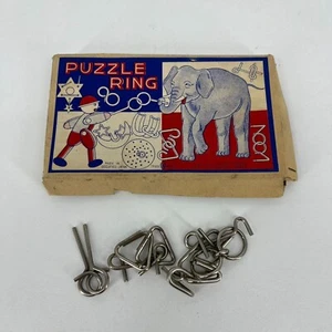 Vintage Puzzle Ring Boxed Set Japanese Ring Puzzles 1940s 1950s Made in Japan - Picture 1 of 6