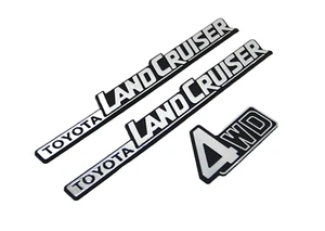 Toyota Land Cruiser FJ60 Side and Rear 4WD Emblems 1981-1990 (Adhesive) - Picture 1 of 6